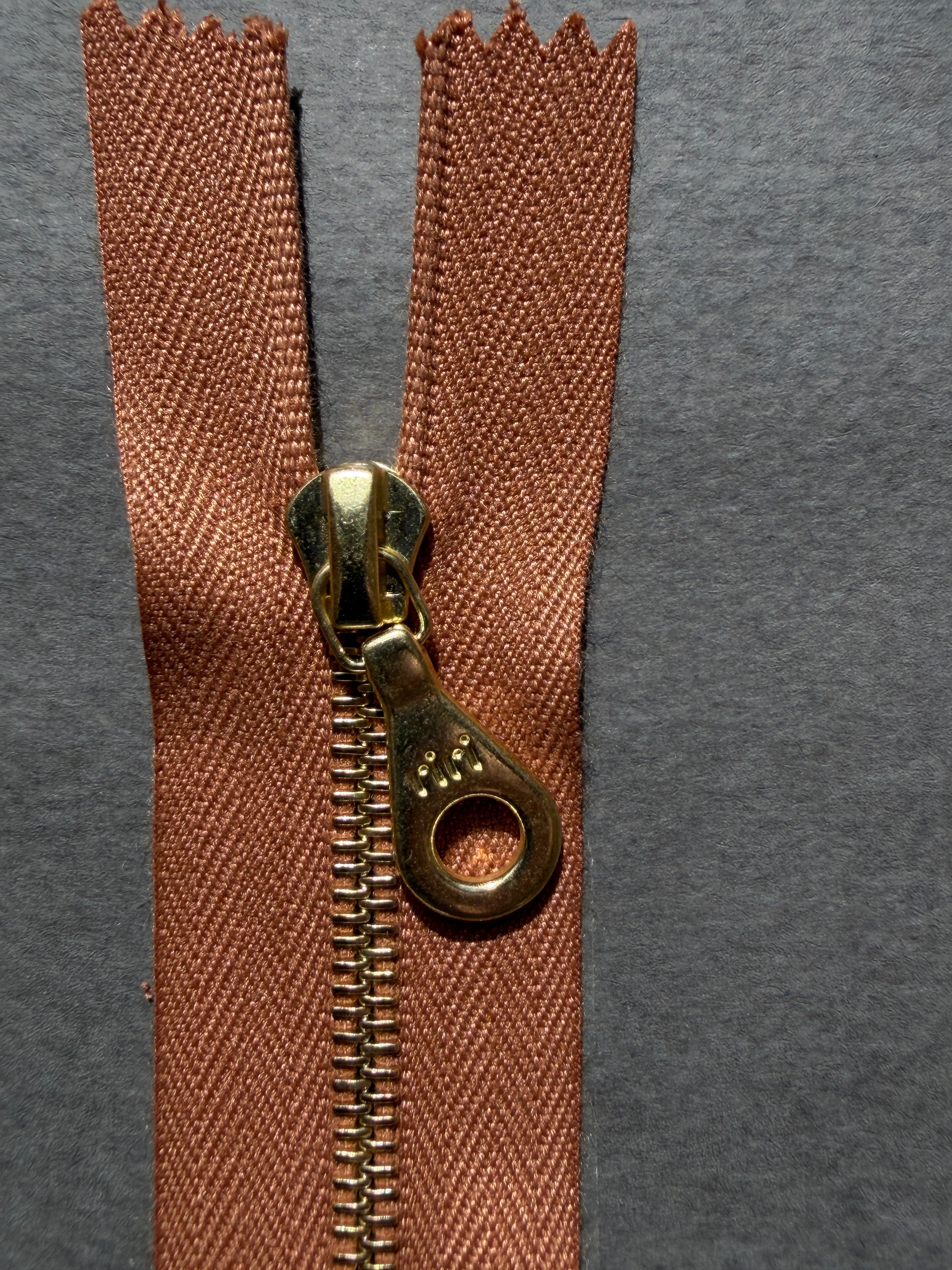 Close up Riri closed end metal zip gold brown 18 & 20cm SP Haberdashery Auckland NZ