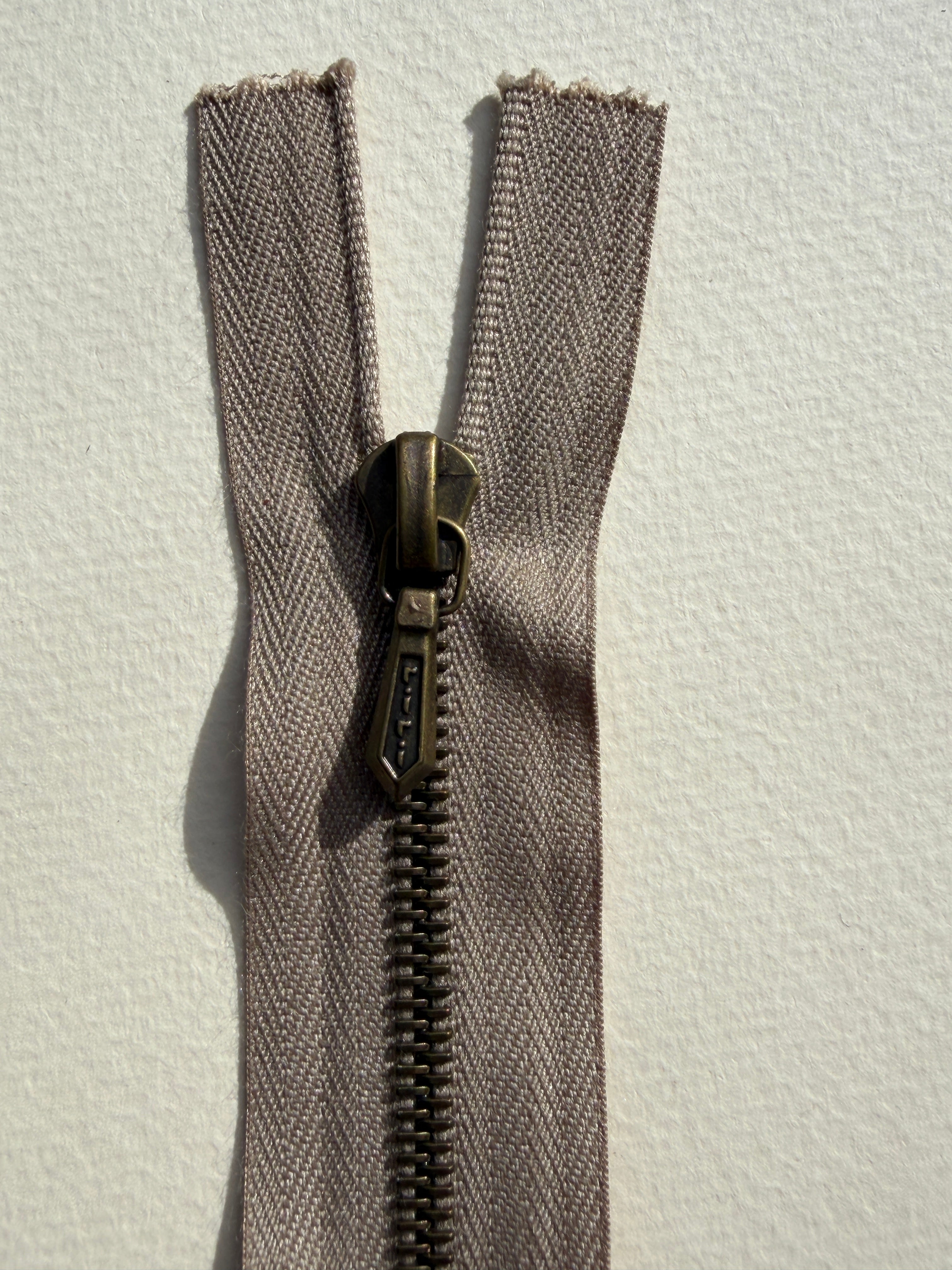 Close up Riri  closed end metal zip antique brass 20cm SP Haberdashery Auckland NZ