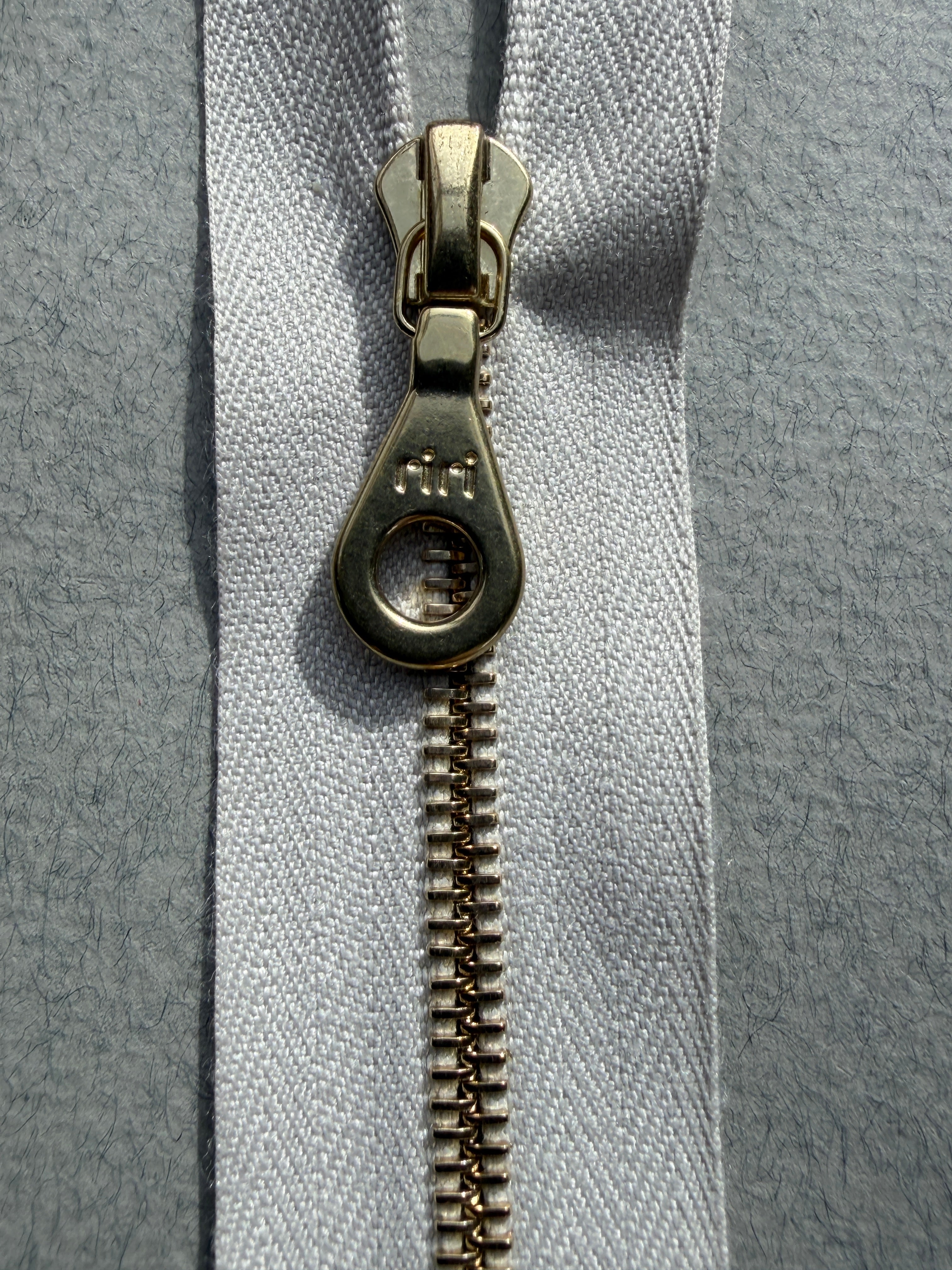 Close up Riri closed end metal zip white gold  55cm SP Haberdashery Auckland NZ