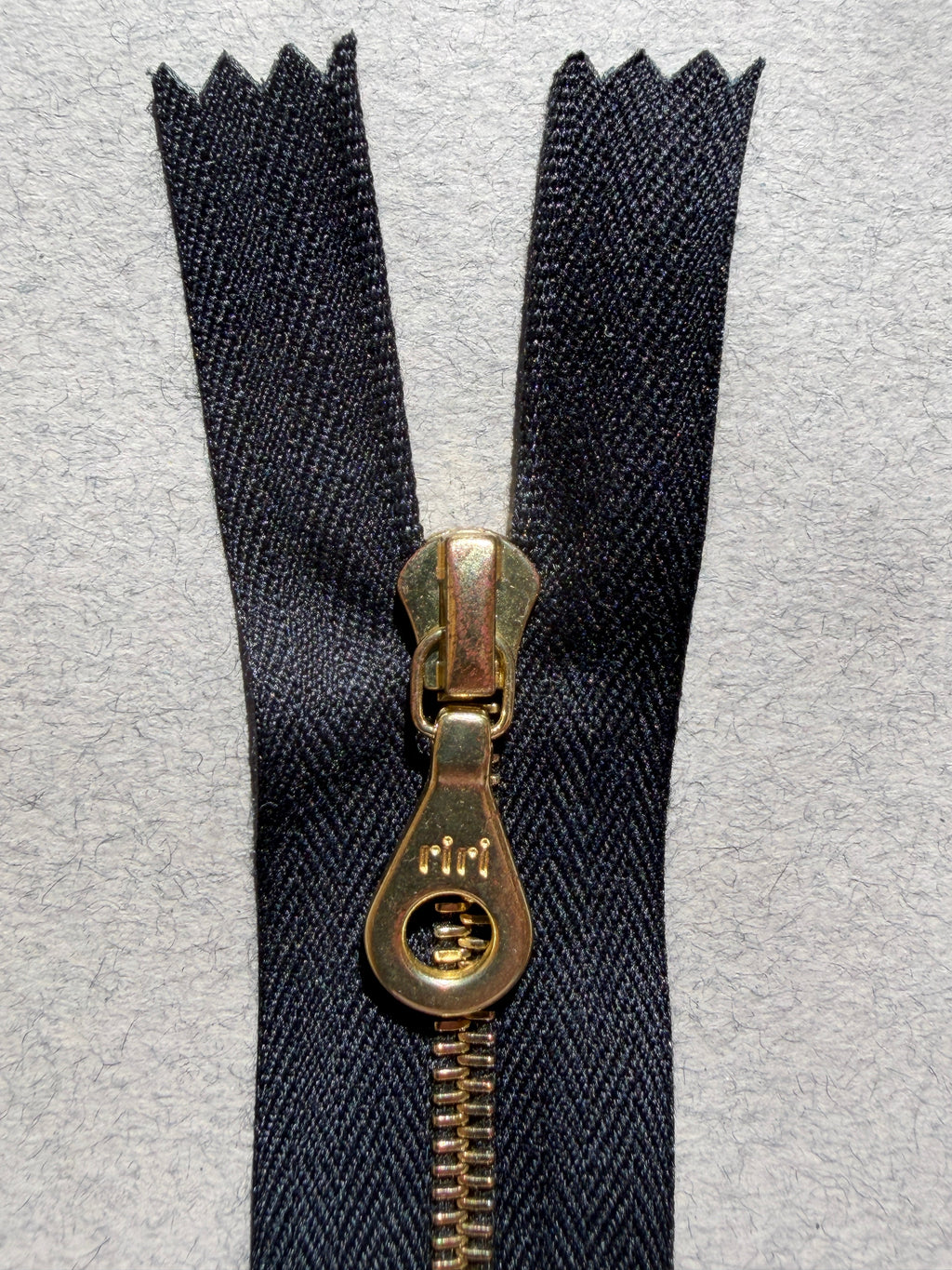 Close up Riri closed end metal black gold  Zip 5 lengths SP Haberdashery Auckland NZ