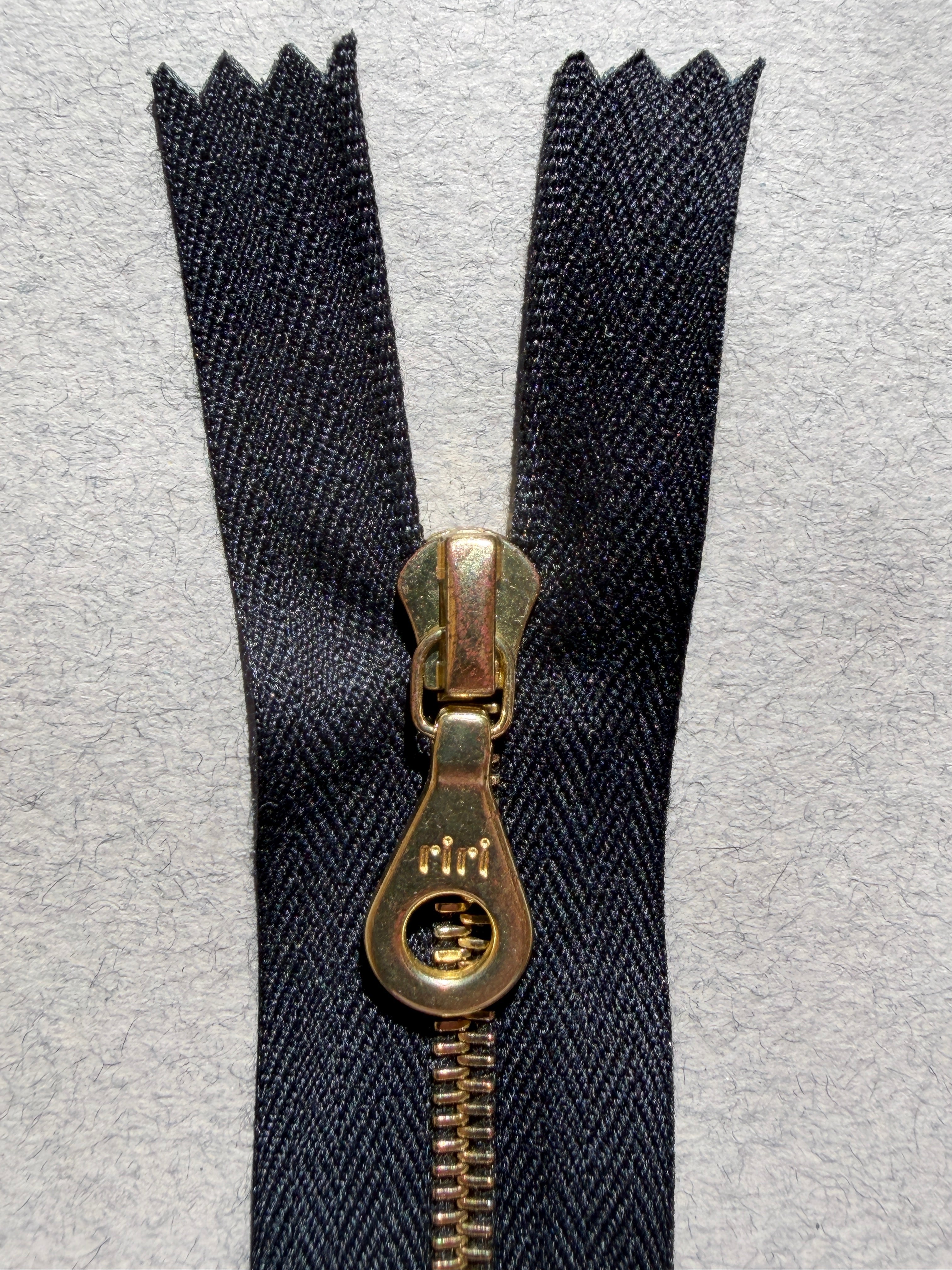 Close up Riri closed end metal black gold  Zip 5 lengths SP Haberdashery Auckland NZ