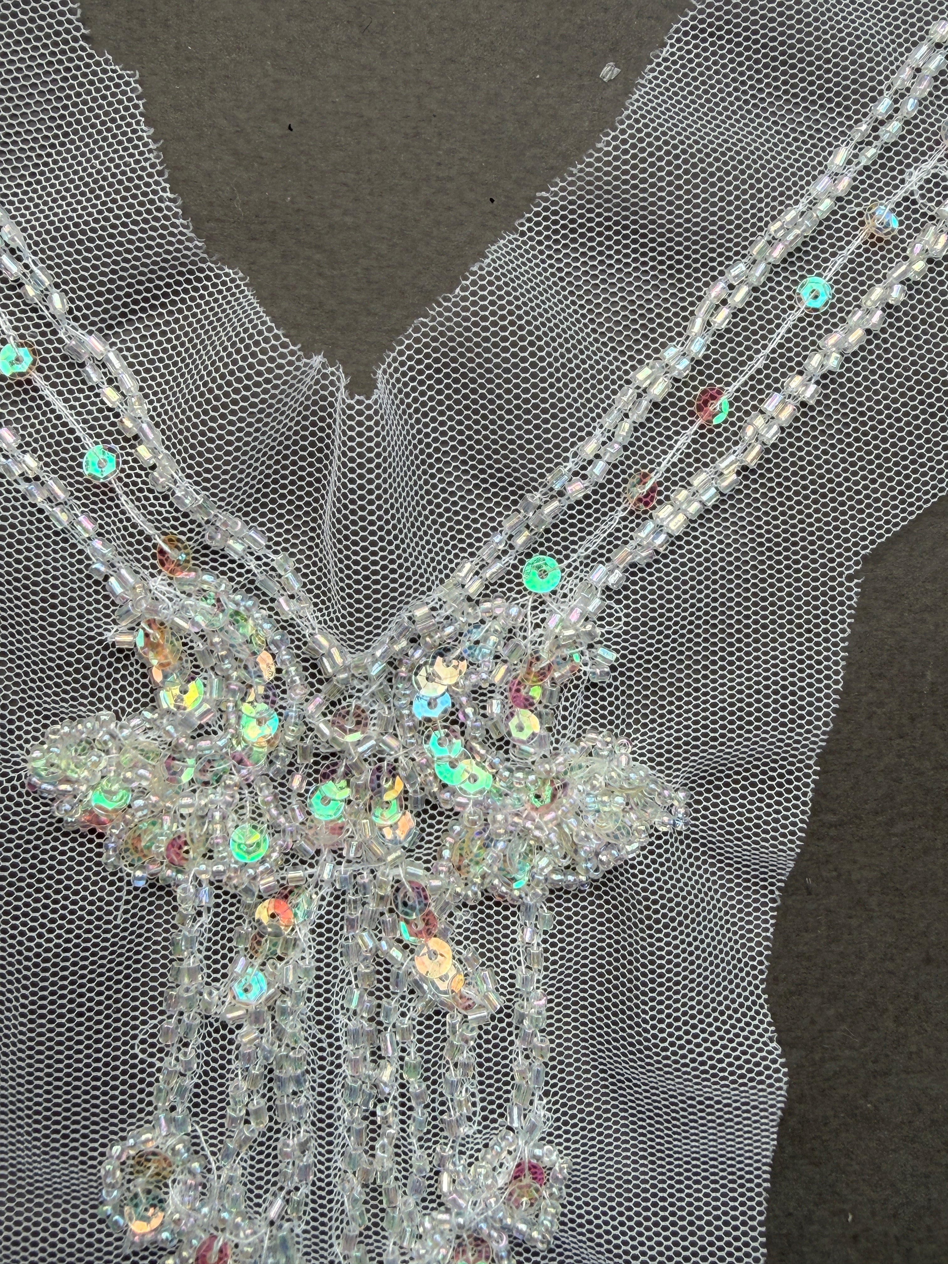 Close up sequin sewn on net  neckline trim SP Haberdashery  Auckland NZ