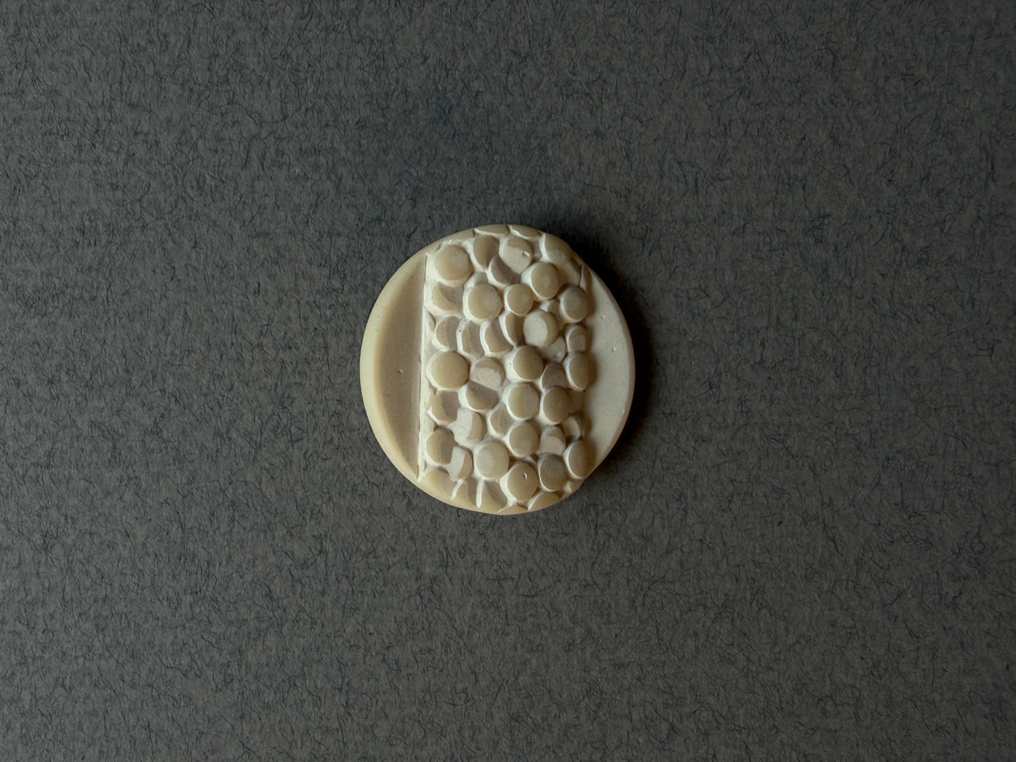 Cream resin pebble motif shank button SP Haberdashery Auckland NZ