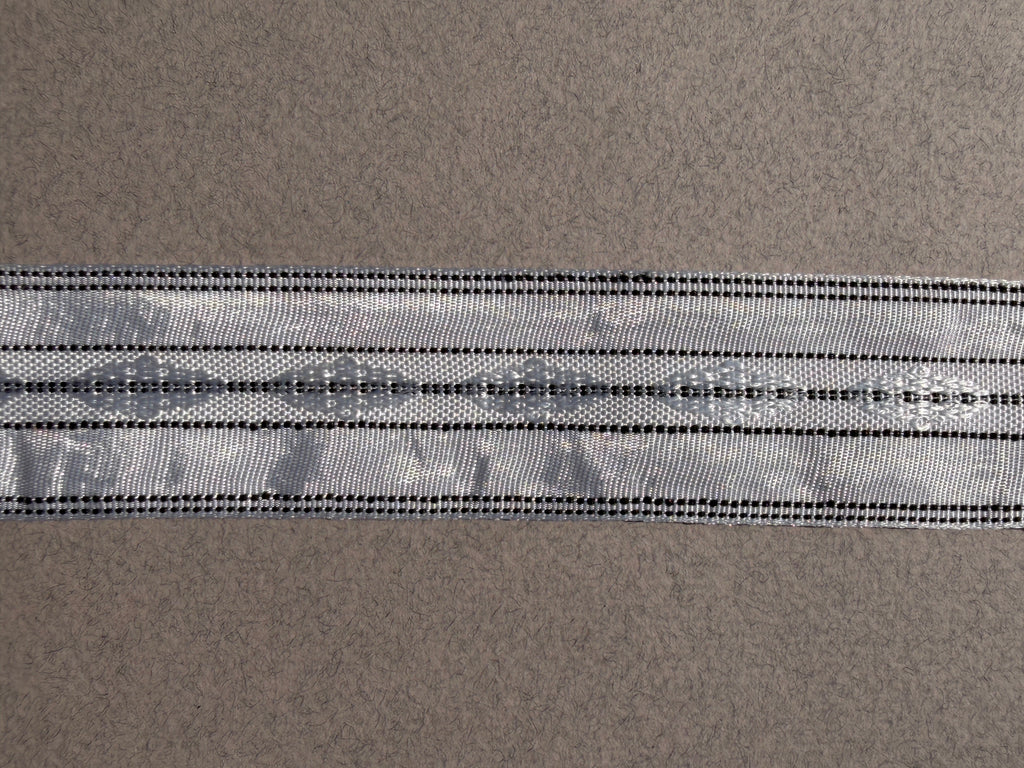 Silver satin ribbon with embroidery and black stitching 32mm wide