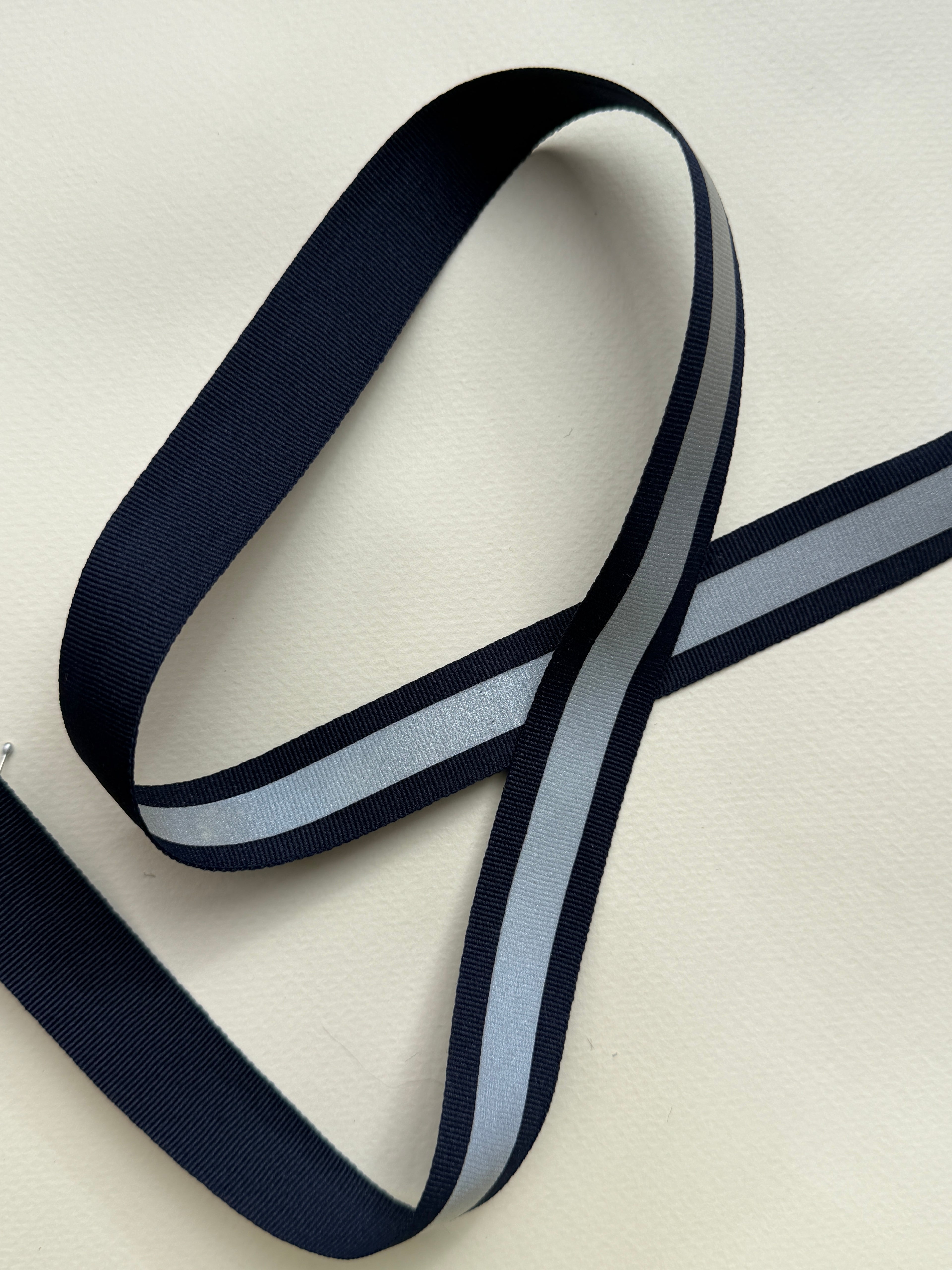 Navy woven ribbon with reflective centre strip 20mm