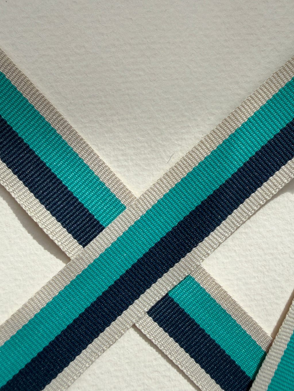 closeup of ecru stripe woven ribbon 20mm