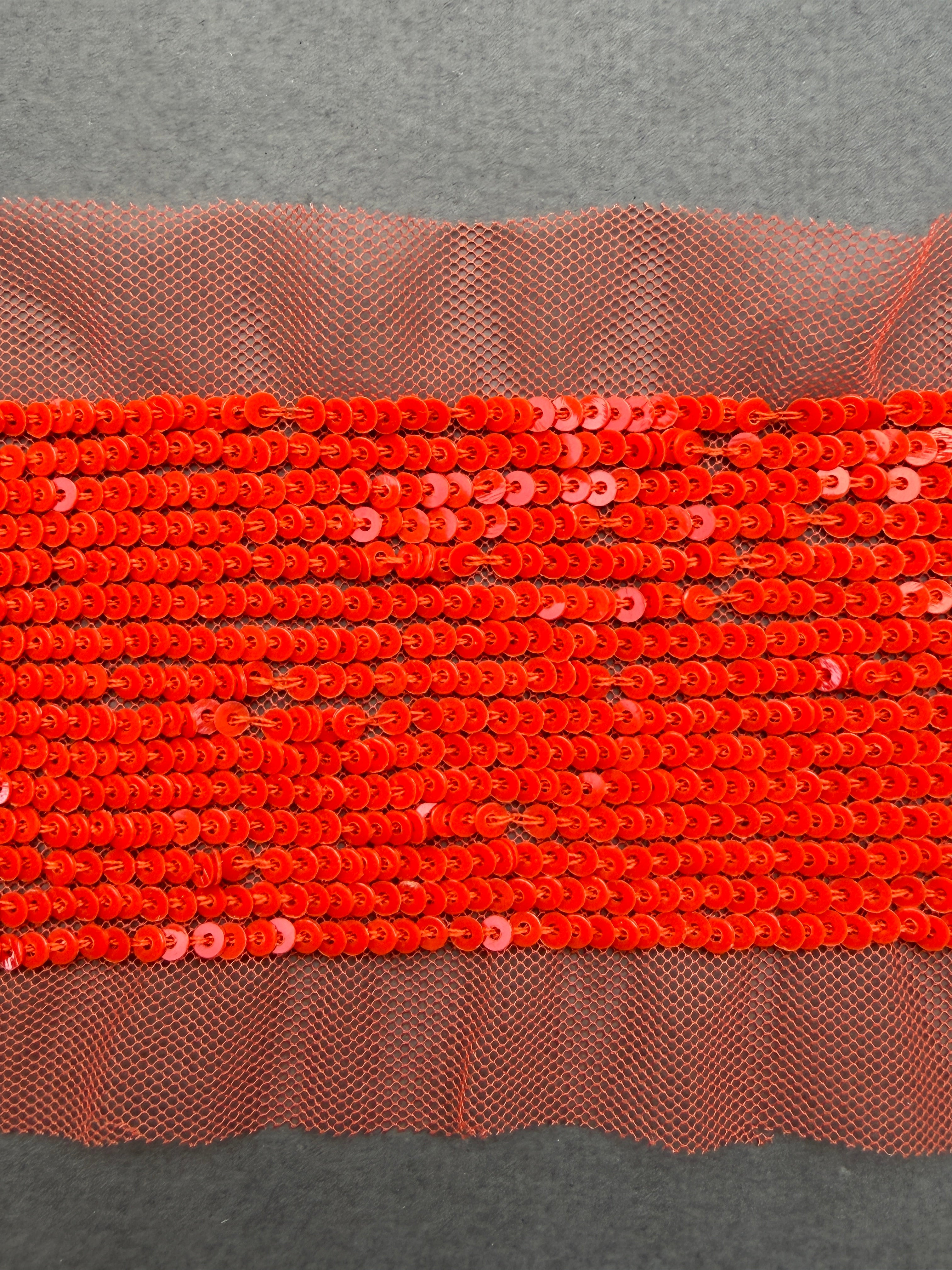 Orange sequins sewn on net  SP Haberdashery Auckland NZ