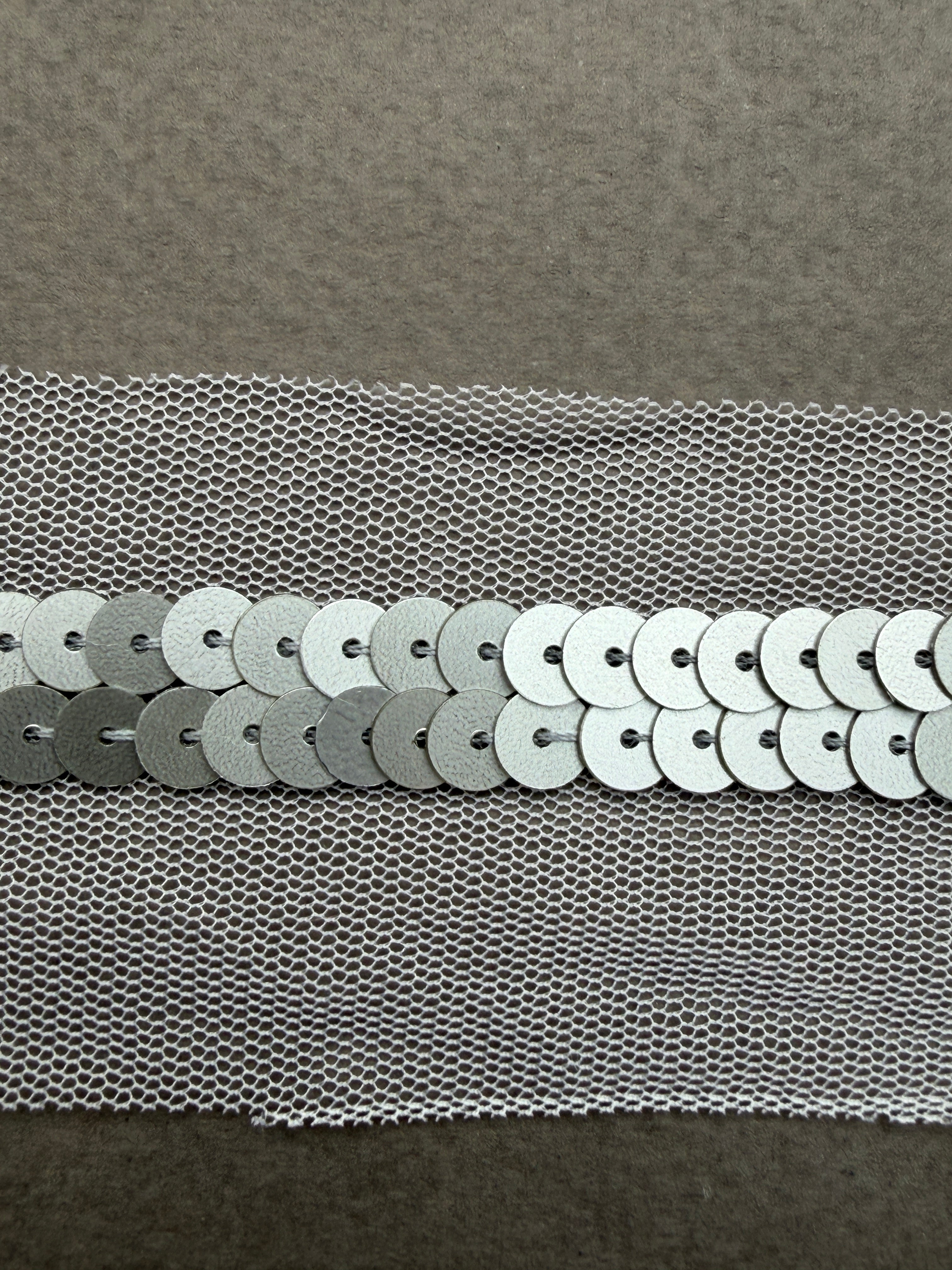 Pewter sequins 2 lines sewn on net SP Haberdashery Auckland NZ