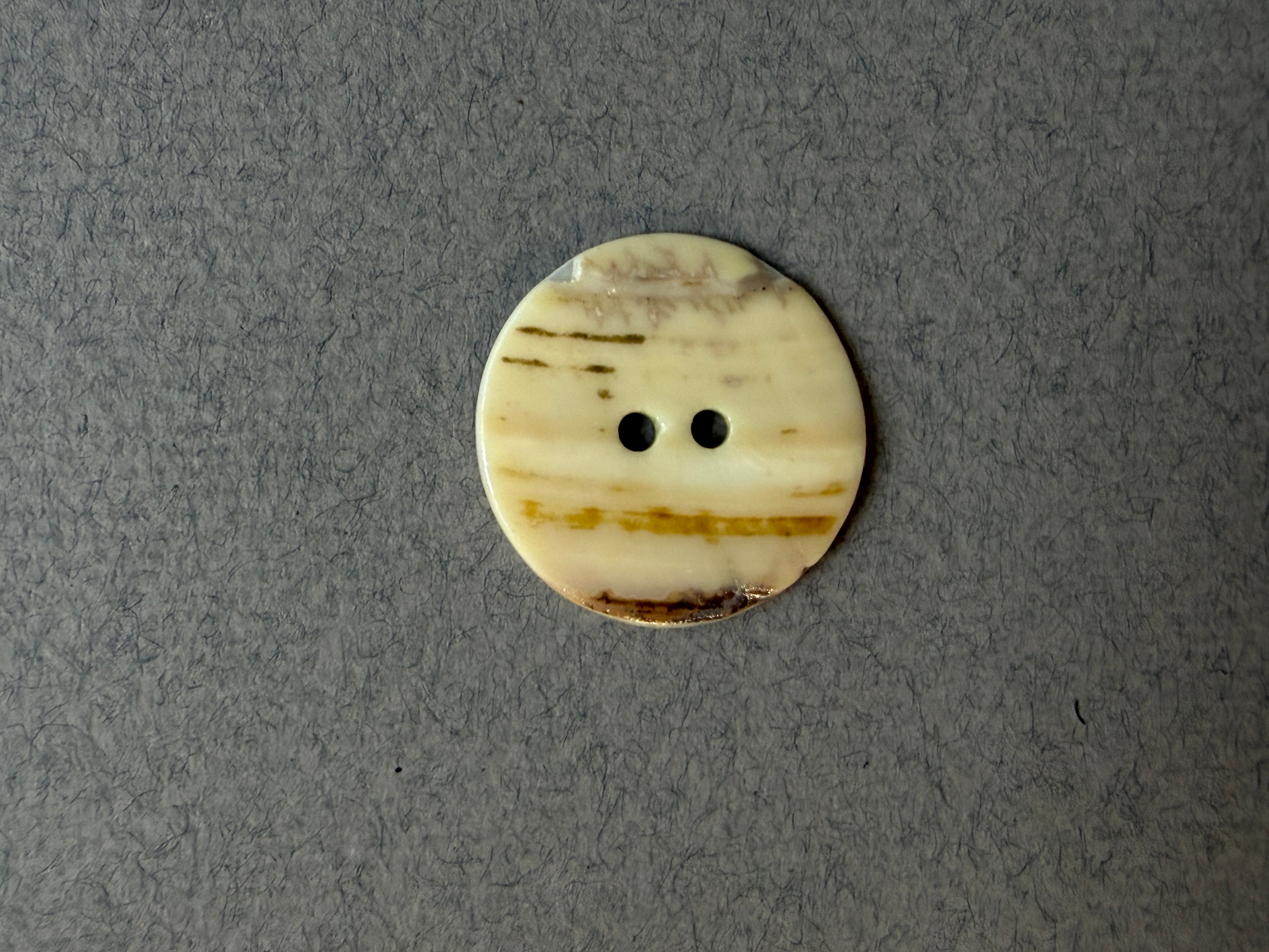 Reverse side natural shell button with landscape motif SP Haberdashery Auckland NZ