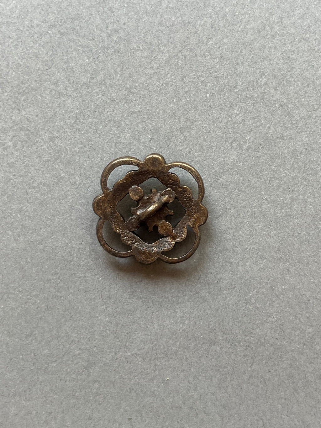 Reverse side metal filigree with green diamantes shank button P Haberdashery Auckland NZ