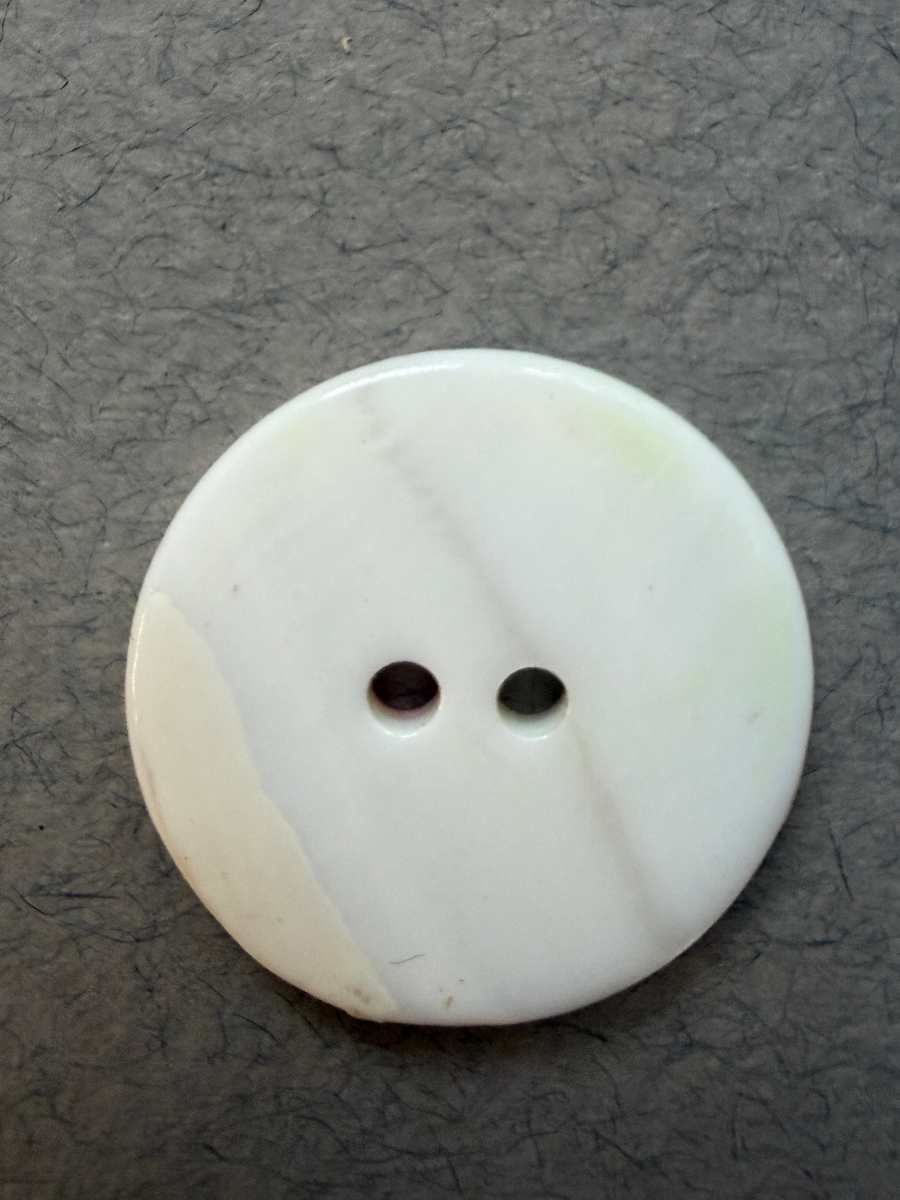Reverse side natural shell button with floral motif SP Haberdashery Auckland NZ