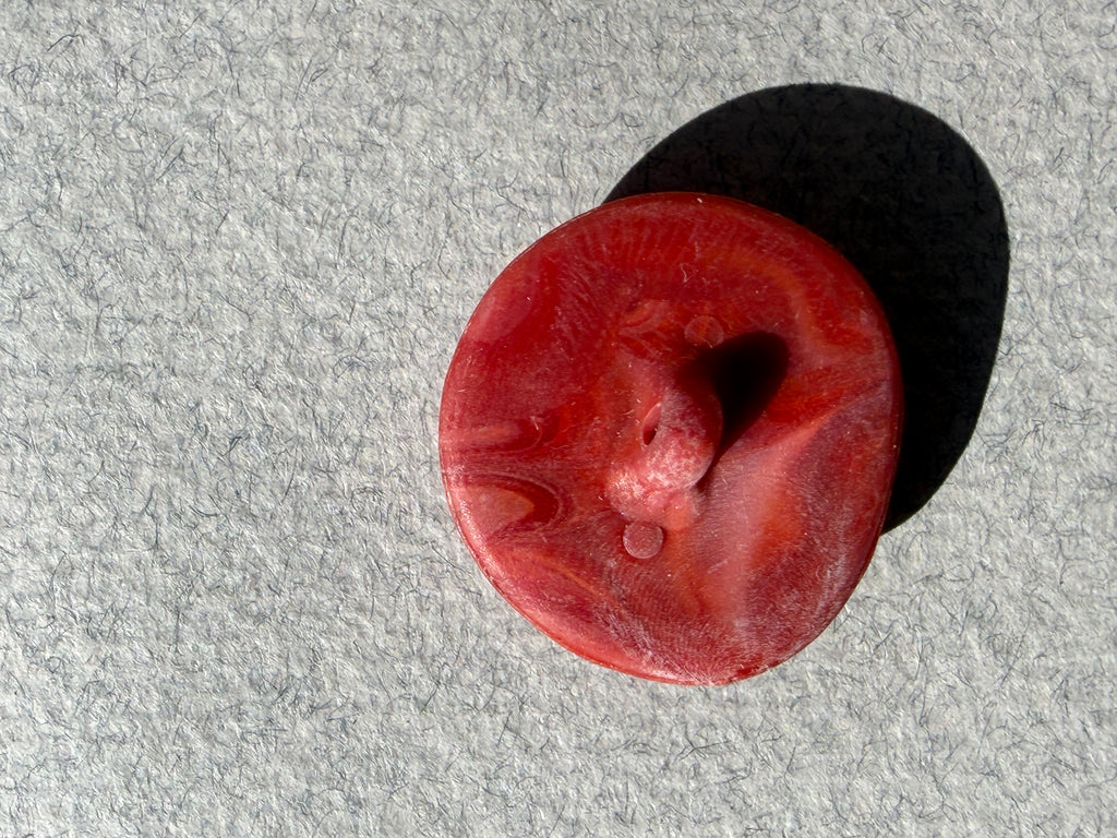 Reverse side red resin scroll button SP Haberdashery Auckland NZ