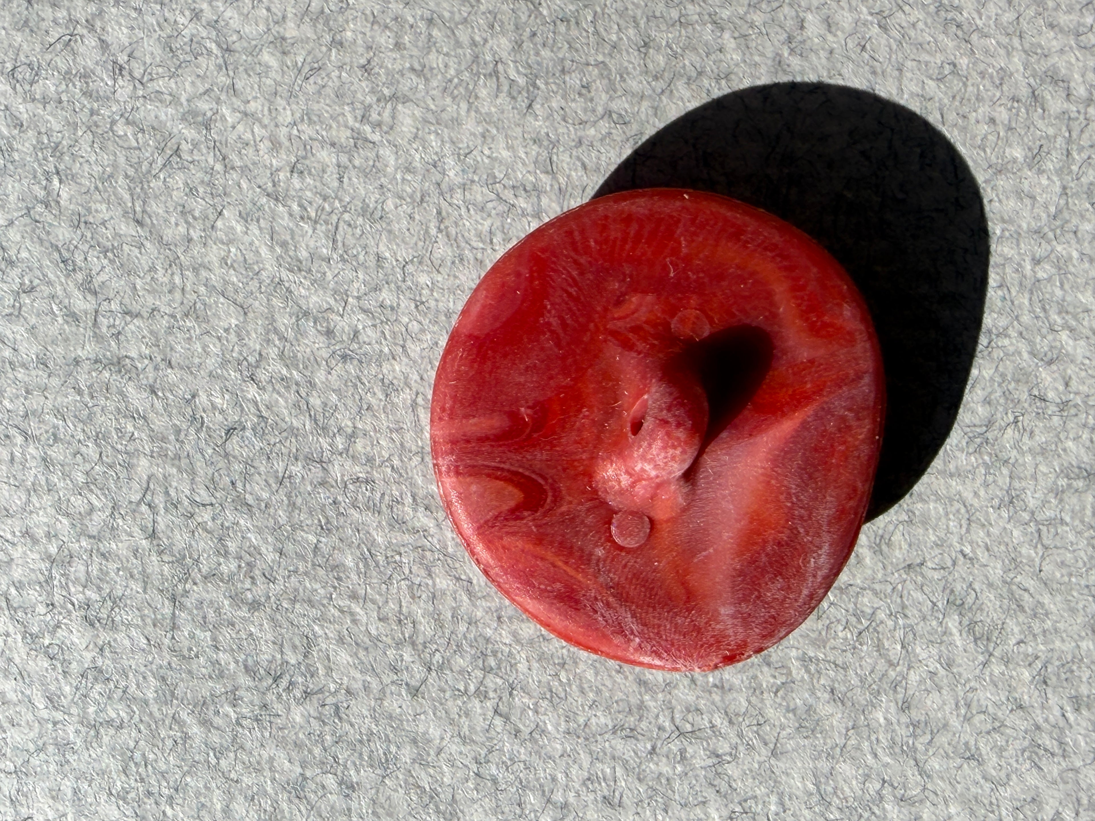 Reverse side red resin scroll button SP Haberdashery Auckland NZ