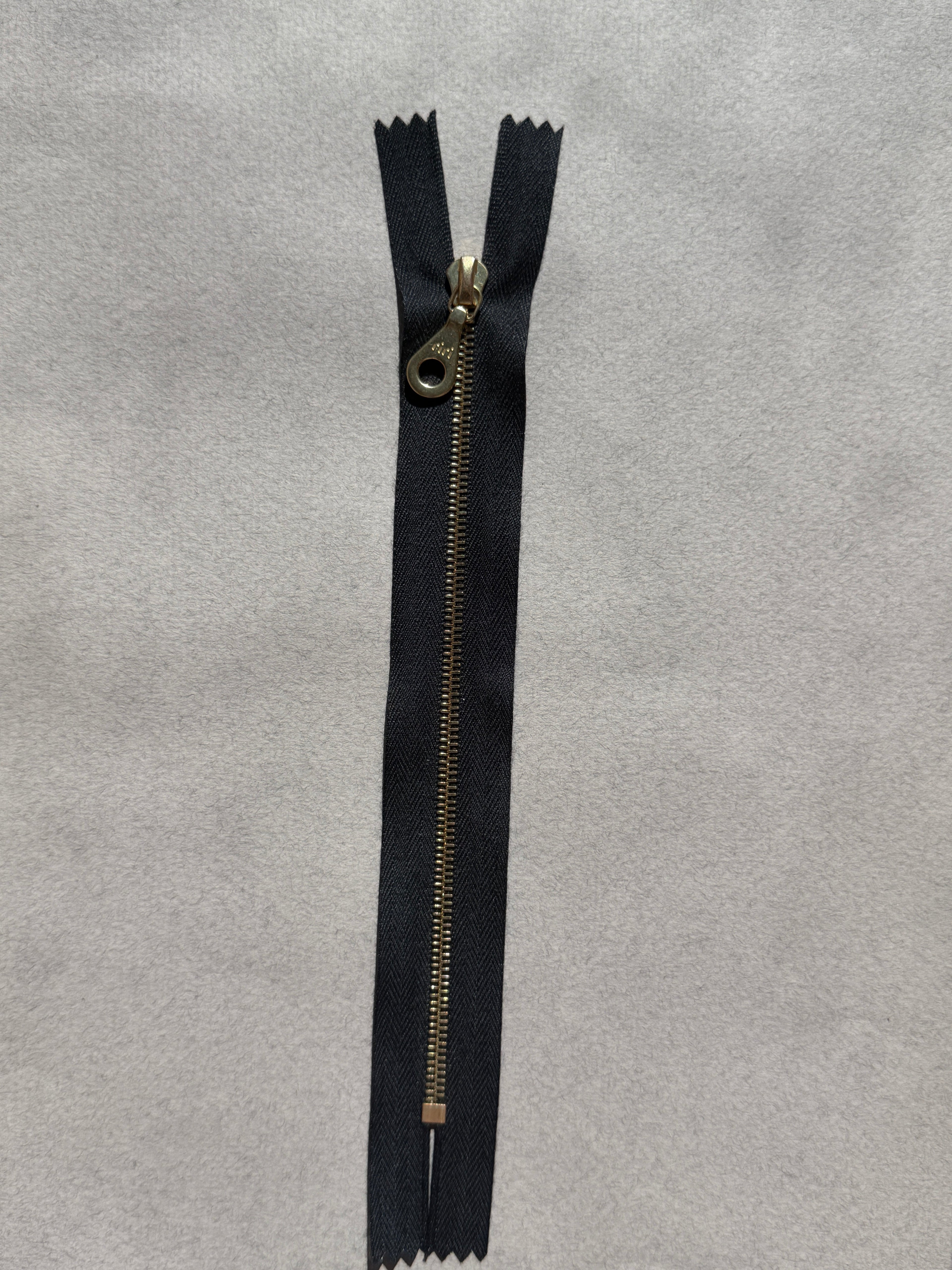 Riri   closed end metal zip black gold 5 len  ths SP Haberdashery Auckland NZ