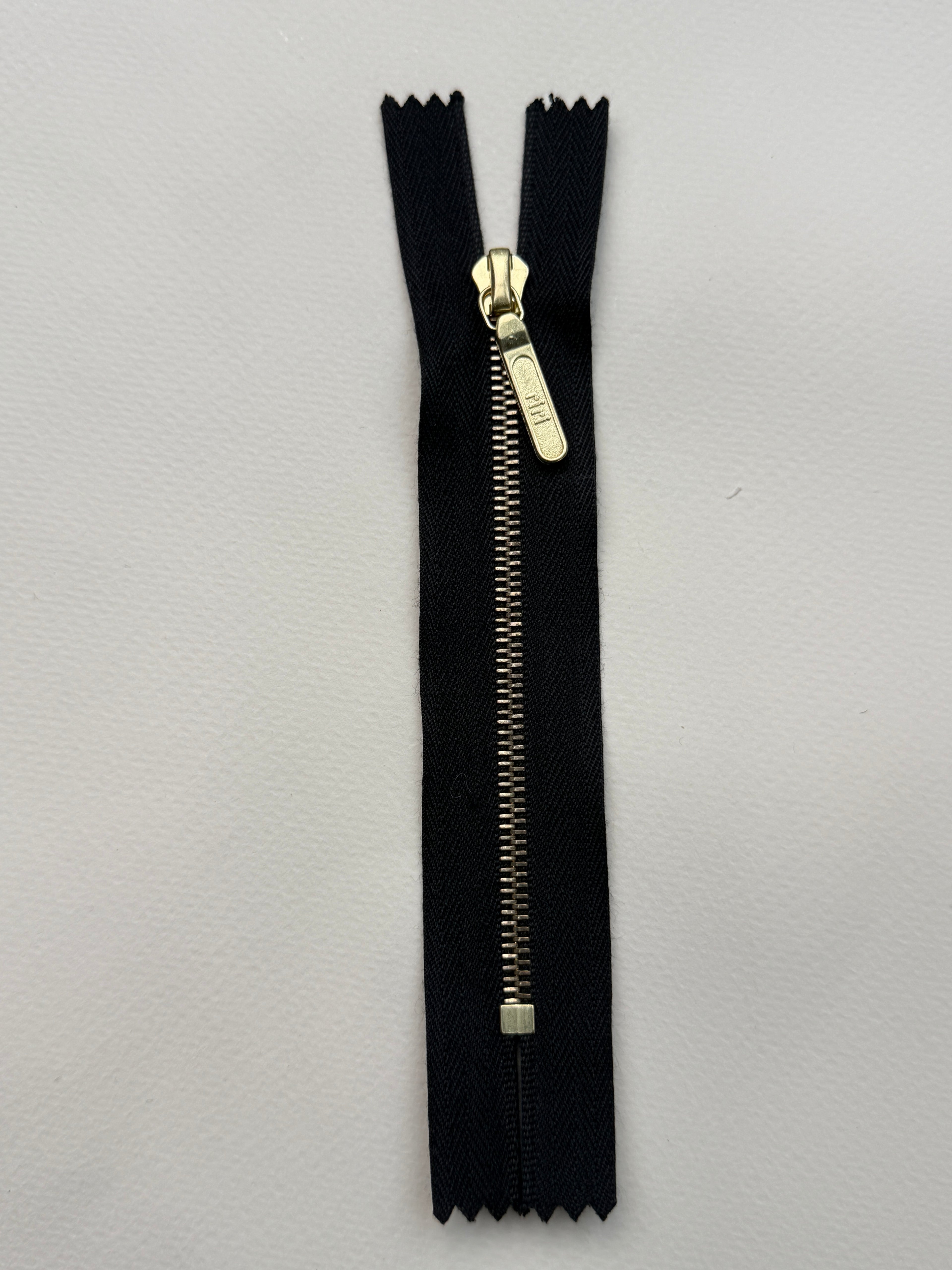 Riri closed end metal zip black gold  11.5cm SP Haberdashery Auckland NZ