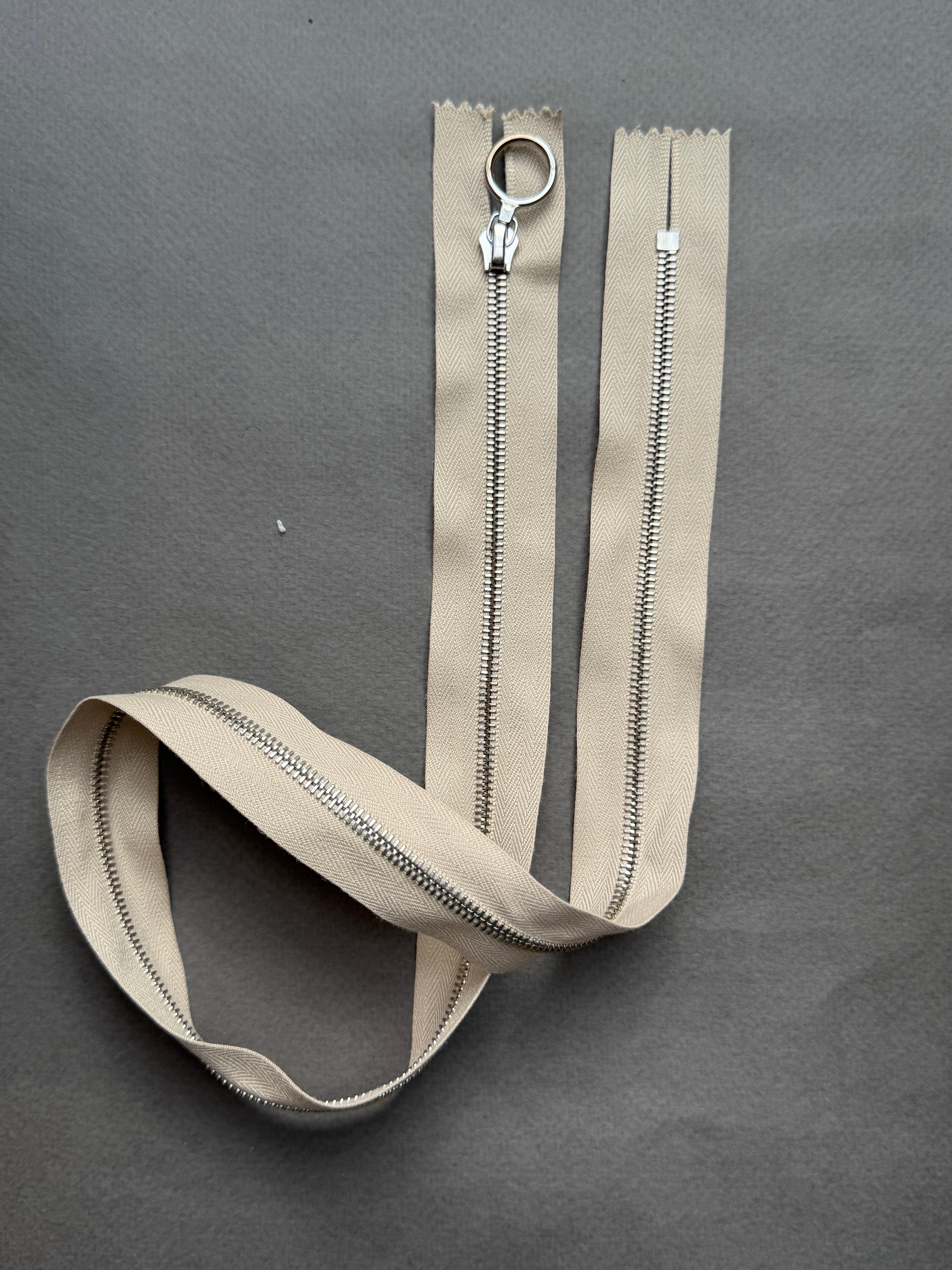 Riri closed end metal zip, silver 4mm chain beige tape 60cm  SP Haberdashery Auckland NZ