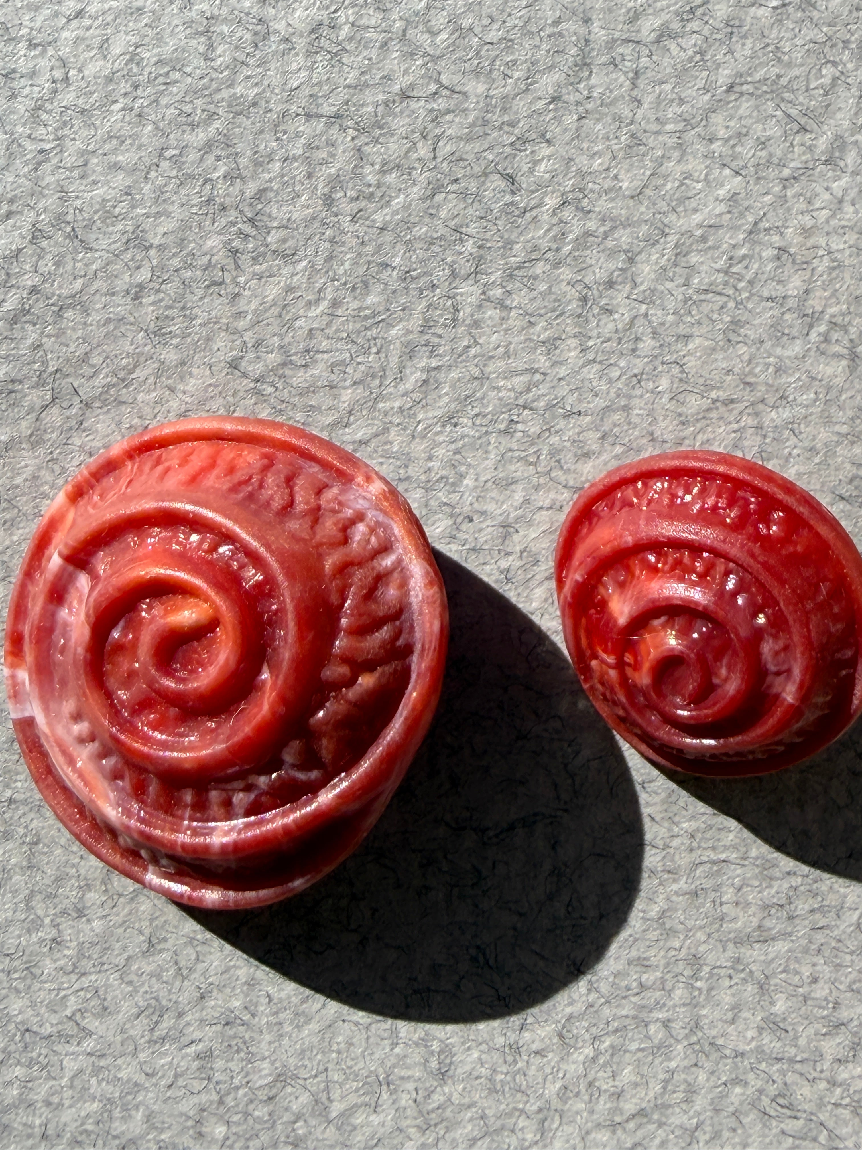 Two sizes red resin scroll shank button SP Haberdashery Auckland NZ