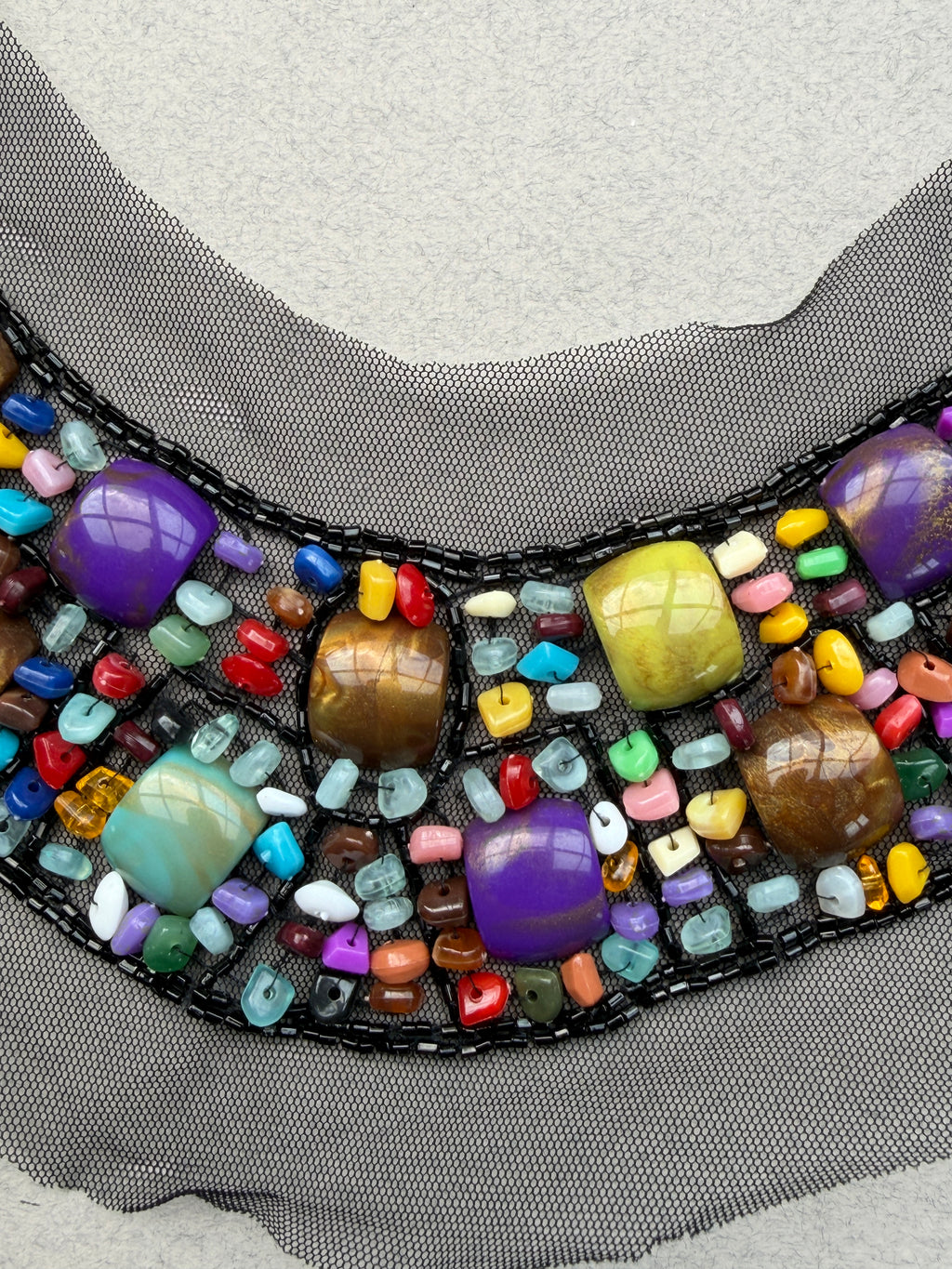 close up coloured bead trim sewn on black net  SP Haberdashery Auckland NZ